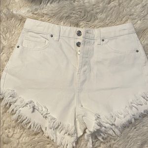 White frayed Jean shorts.